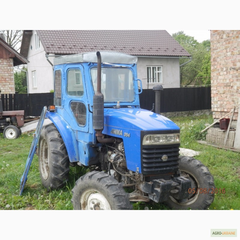 купит трактор маленькую