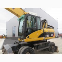 Грейферный перегружатель Caterpillar M318D