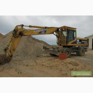 Продам Колёсный экскаватор CAT M320