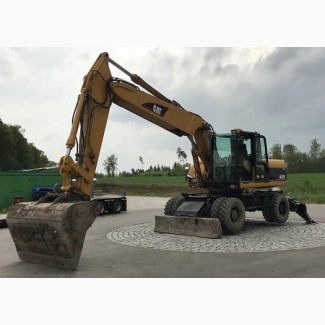 Колесный экскаватор CATERPILLAR M322С 2006 г