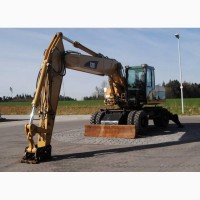 Колесный экскаватор CATERPILLAR M322С 2006 г