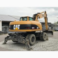 Колесный экскаватор CATERPILLAR M322С 2006 г