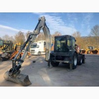 Экскаватор-погрузчик Terex TLB890PS