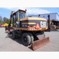 Колесный экскаватор Caterpillar M 315 в Украине